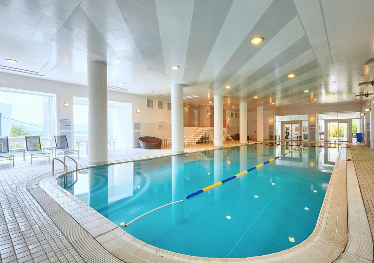 Hotel Mahaina Wellness Resorts Окинава Экстерьер фото